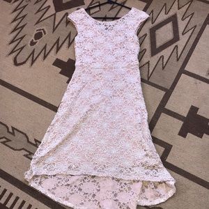 Beautiful dress short in front long in back.